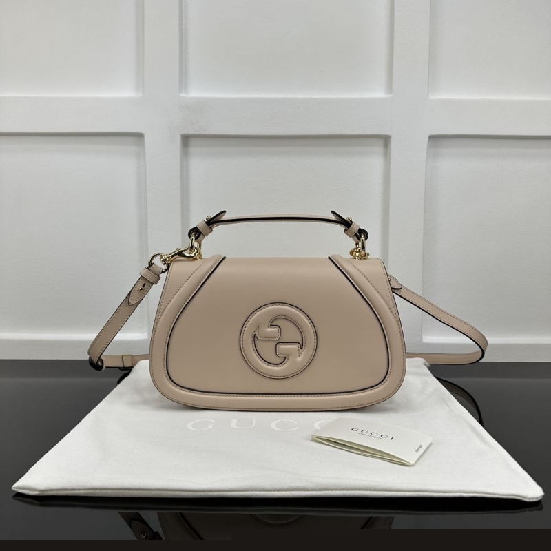 G*u*i top handle bags